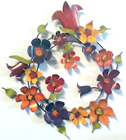 Floral wall art circular - steel metal art with colourful flowers wholesale